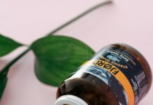 정신 건강에 좋은 음식과 운동 a close up of a bottle of pills next to a plant