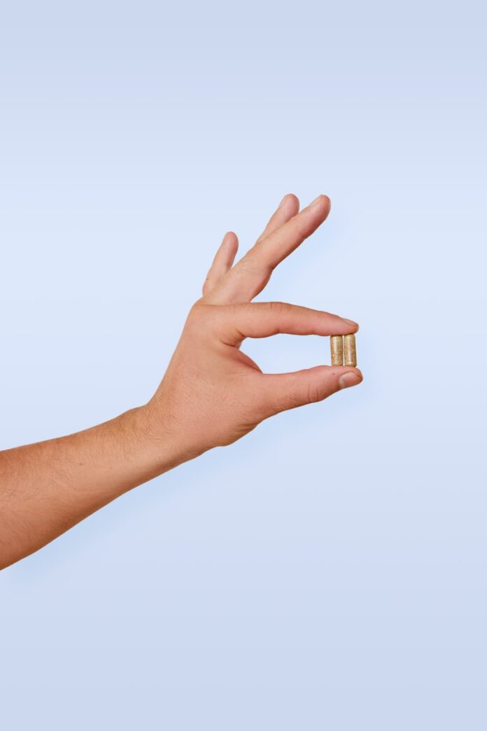 Photo by Shruti Mishra A person's hand with a ring on it